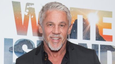 Wayne Lineker smiling during a photoshoot in Ibiza.