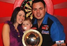 Portrait of Sarah Podmore, the supportive wife and backbone of darts champion Adrian Lewis, symbolizing love, resilience, and family strength.