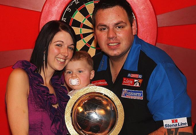 Portrait of Sarah Podmore, the supportive wife and backbone of darts champion Adrian Lewis, symbolizing love, resilience, and family strength.