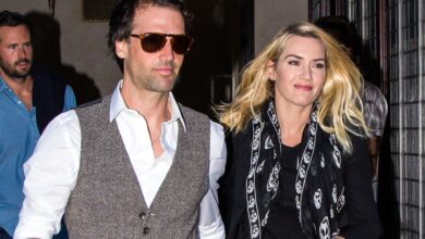 Edward Abel Smith and Kate Winslet walking together at a public event