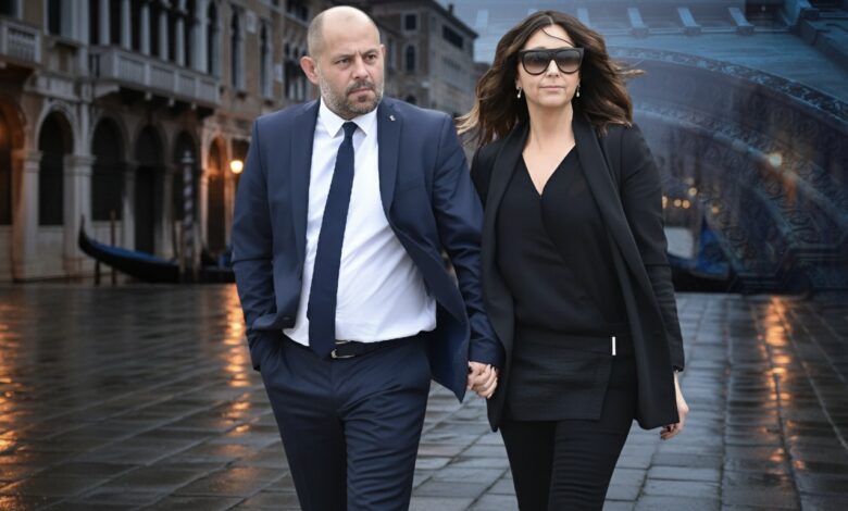 Drew Pritchard standing in his antique shop surrounded by vintage furniture and reclaimed items.
