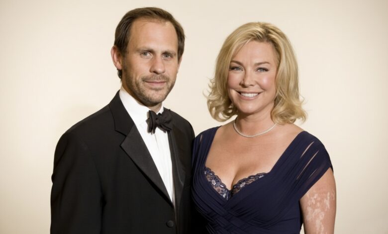 Portrait of Damian Schnabel wearing business attire, smiling confidently in a modern office setting