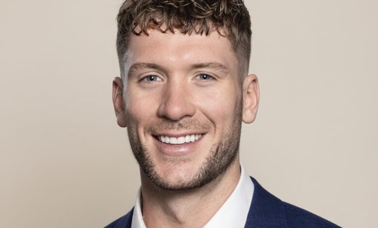 Charlie Radnedge smiling during a public event