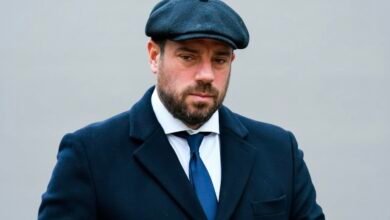 Mark Redknapp smiling in a casual outdoor portrait