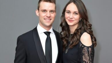 Kali Woodruff Carr attending a formal gathering with a calm expression”