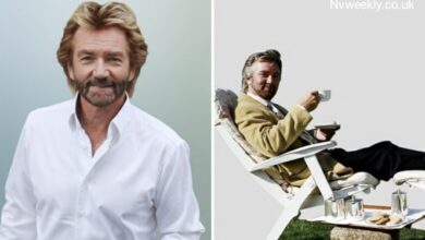 Noel Edmonds smiling in a studio portrait, British TV presenter known for Deal or No Deal