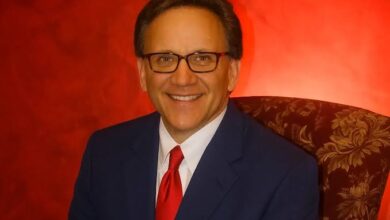 Mark Spaeny tailoring a custom suit in his Springfield studio, representing precision and bespoke craftsmanship.