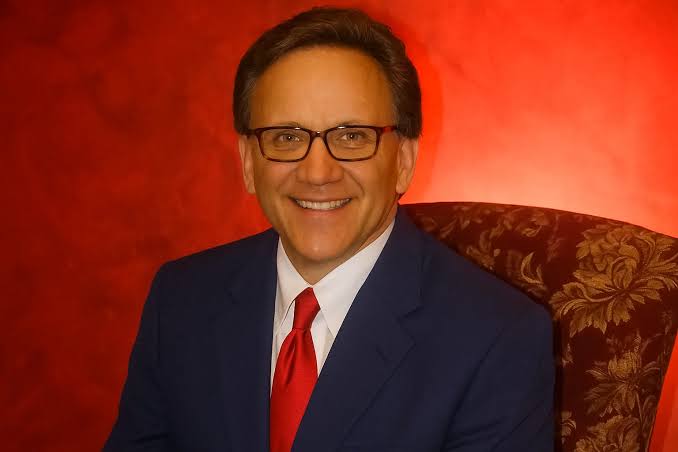 Mark Spaeny tailoring a custom suit in his Springfield studio, representing precision and bespoke craftsmanship.