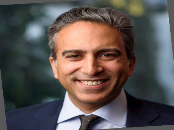 Portrait of Meekal Hashmi, the visionary leader in global finance shaping the future of financial systems with strategic insight and technological innovation."