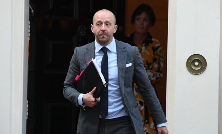 Lee Cain speaking at a political event, representing his role in government communications.